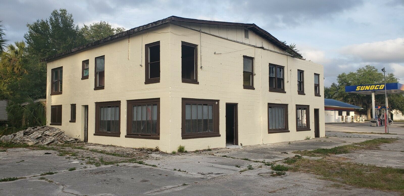 Investor Special - Two Story Commercial Building On 1/2 Acre